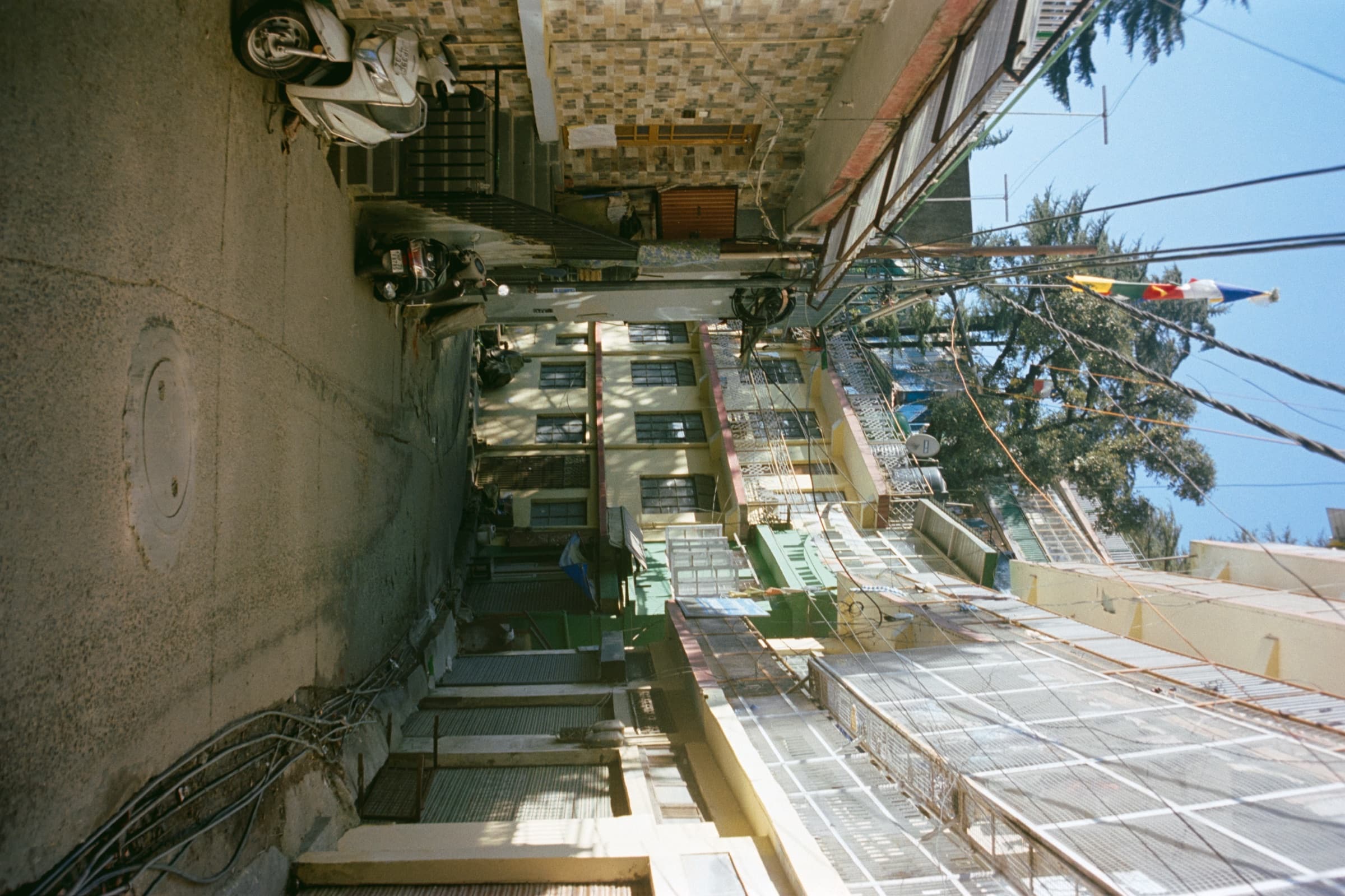 An alley of wires and rooftops, Dharamshala