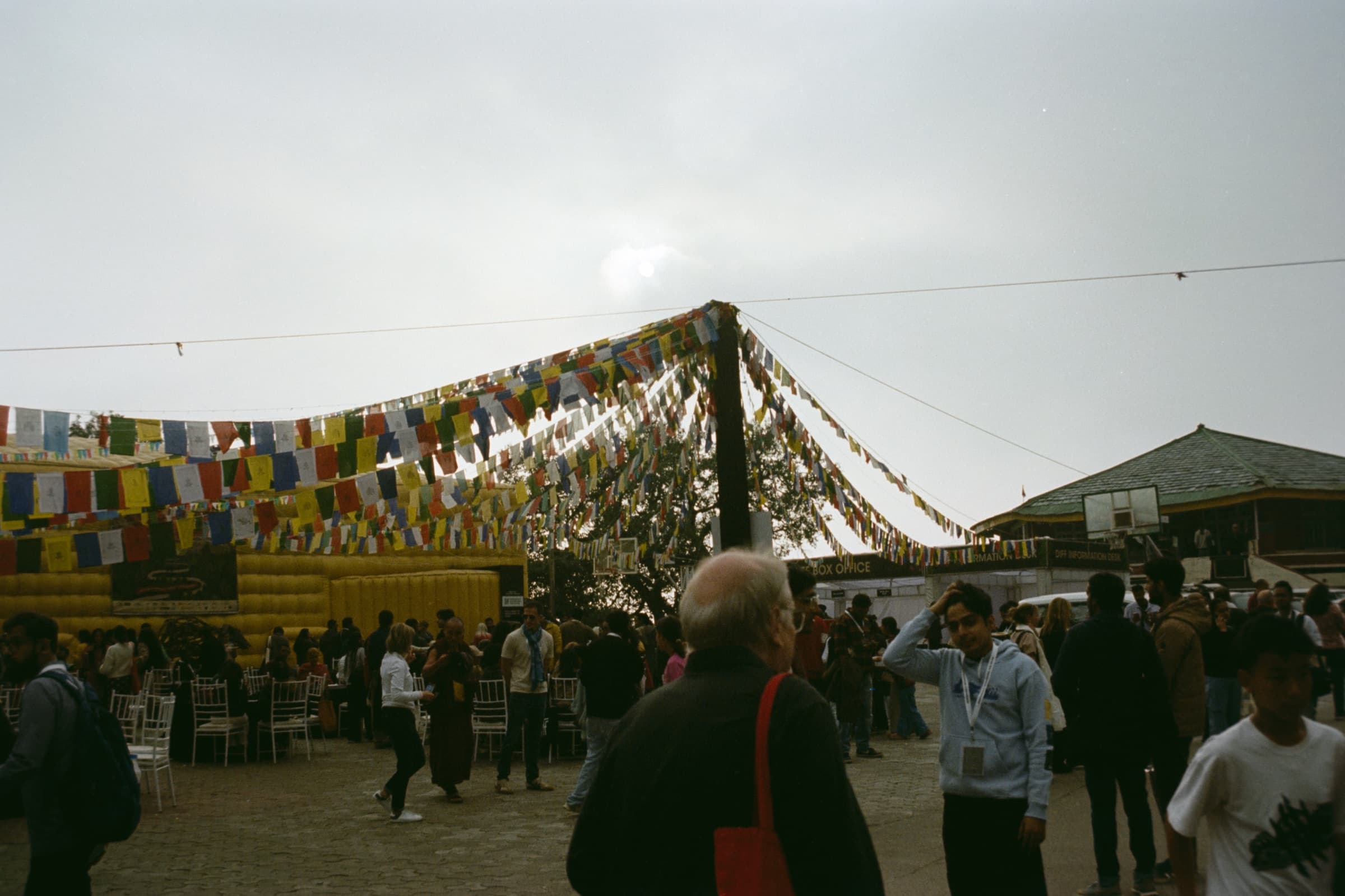 Prayer flags over a festival crowd, Dharamshala