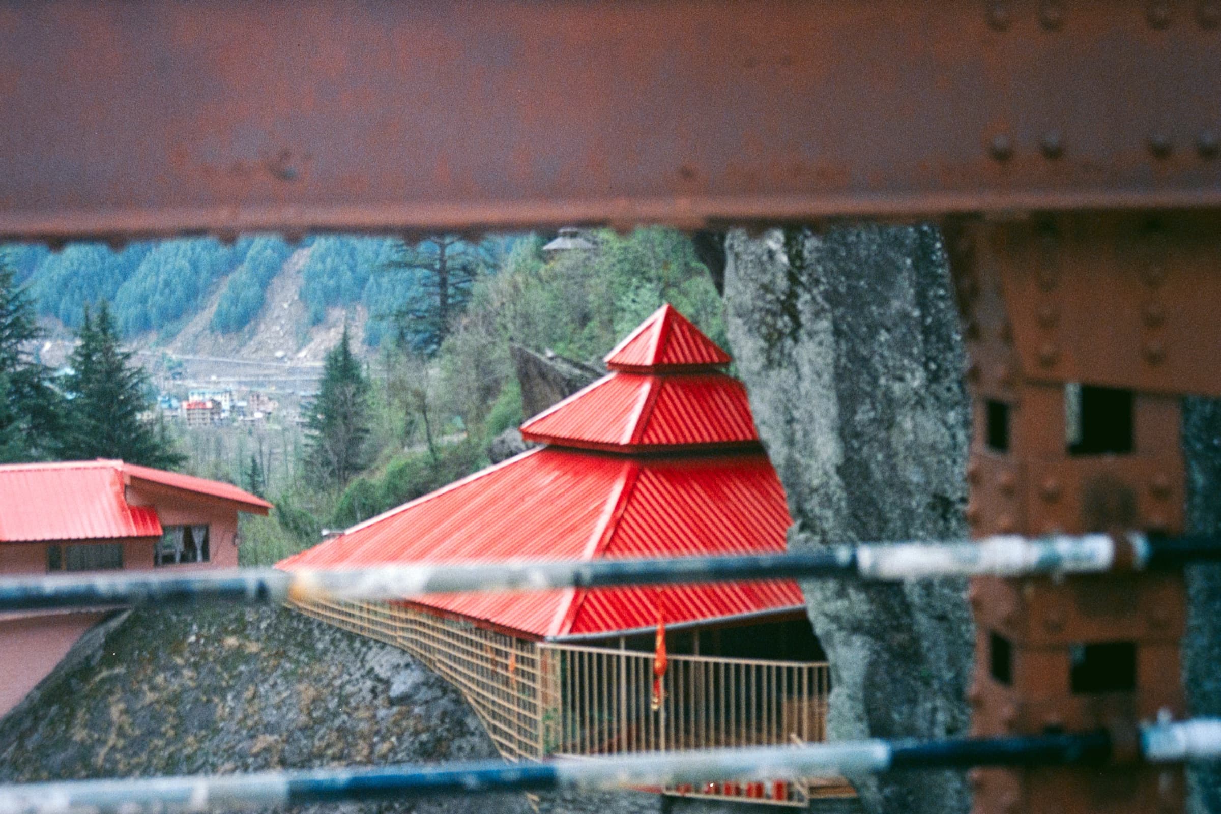 A red pavilion reflected, Manali